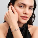 Sterling silver clip with clear cubic zirconia, shimmering white enamel and silicone grip