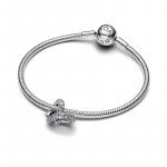 Infinity knot heart sterling silver charm with clear cubic zirconia