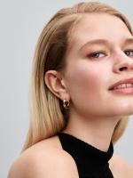 Twisted 14k gold-plated hoop earrings