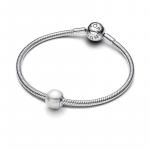 Sterling silver charm with white lacquered artificial pearl