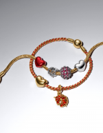 Braided 14k gold-plated box chain bracelet with red textile cord