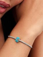 Sterling silver charm with clear cubic zirconia and imitation turquoise