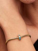 14k gold-plated clip with icy blue and capri blue crystal and silicone grip