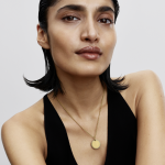 Engravable round 14k gold-plated pendant with clear cubic zirconia