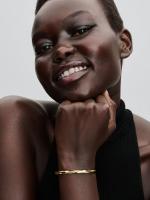 Twisted 14k gold-plated open bangle
