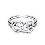 Infinity knot sterling silver ring with clear cubic zirconia