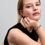 Braided sterling silver box chain bracelet with turquoise textile cord