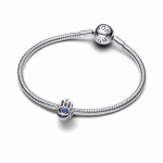 Hamsa hand sterling silver charm with stellar blue crystal