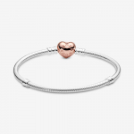 Snake chain silver bracelet with 14k rose gold-plated heart clasp and clear cubic zirconia