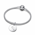 Engravable round sterling silver pendant with 0.012 ct TW G-I VS+ round brilliant very good cut lab-grown diamonds