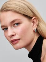 Sterling silver hoop earrings with aquamarine blue crystal