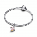 Moveable turtle sterling silver and 14k gold-plated dangle with 0.007 ct TW G-I VS+ round brilliant very good cut lab-grown diamond and pink