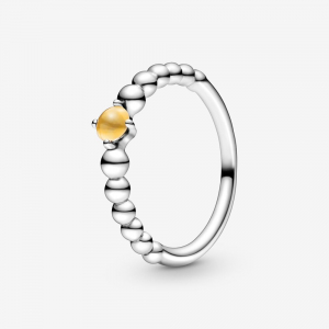 Sterling silver ring with honey coloured crystal