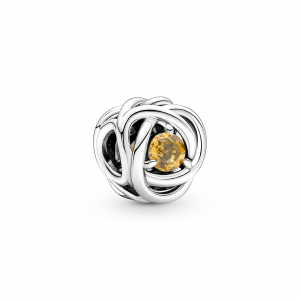 Sterling silver charm with honey coloured crystal