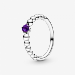 Sterling silver ring with purple crystal