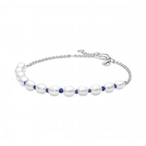 Sterling silver bracelet with white freshwater cultured pearl and blue cord