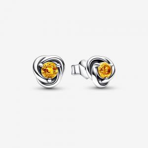 Sterling silver stud earrings with honey coloured crystal
