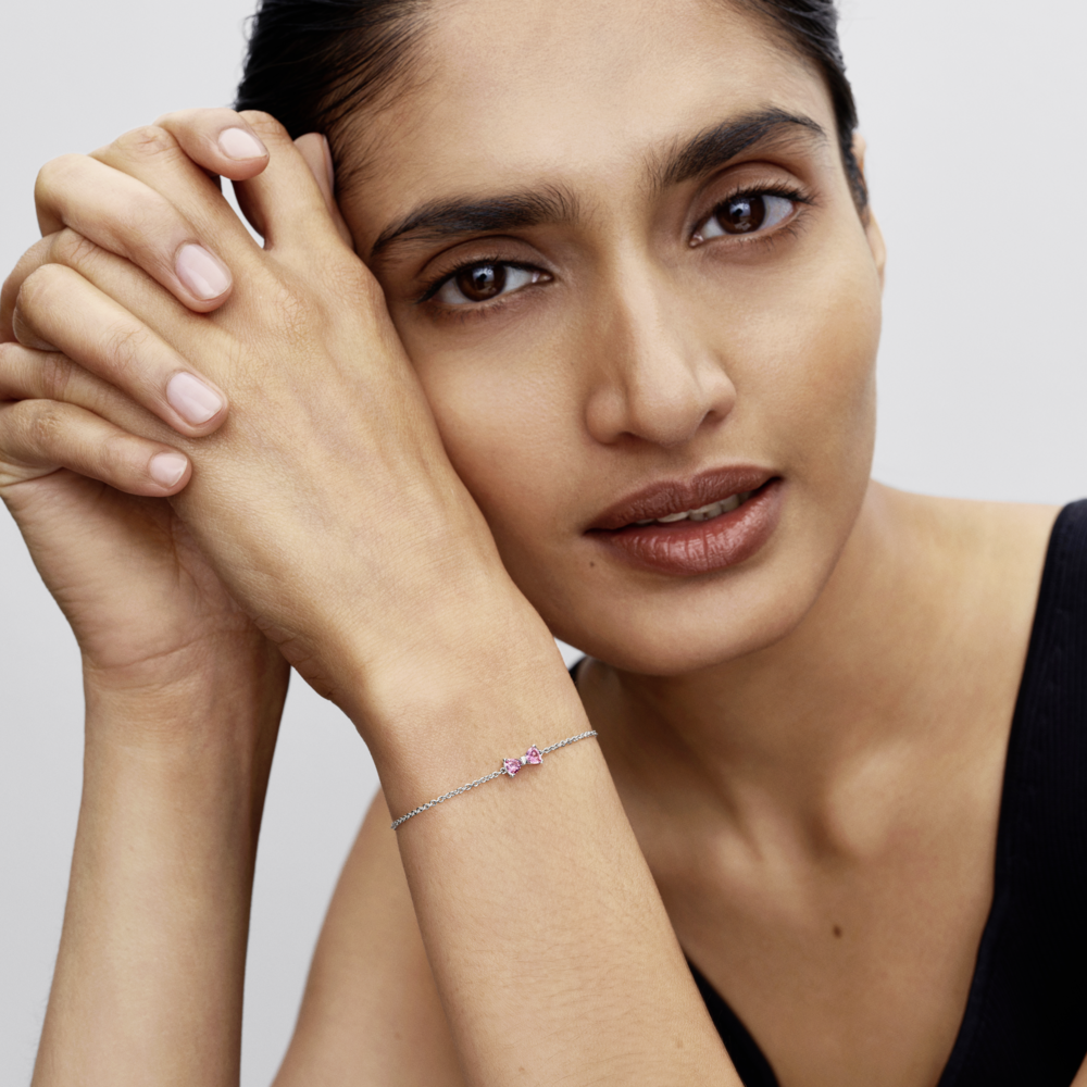 Bow sterling silver bracelet with fancy pink and clear cubic zirconia Bow sterling silver bracelet with fancy pink and clear cubic zirconia