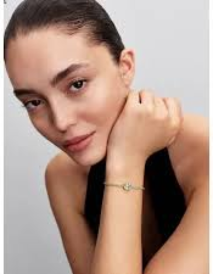 Butterfly 14k gold-plated slider tennis bracelet with pastel green crystal and clear cubic zirconia