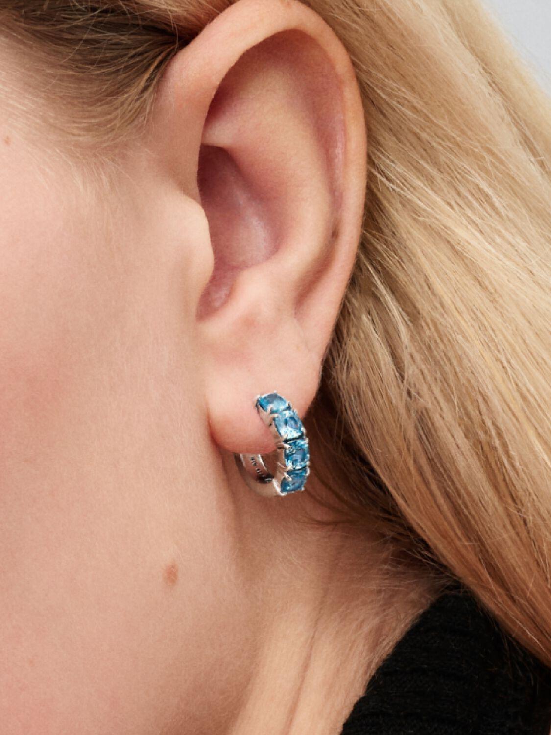 Sterling silver hoop earrings with aquamarine blue crystal