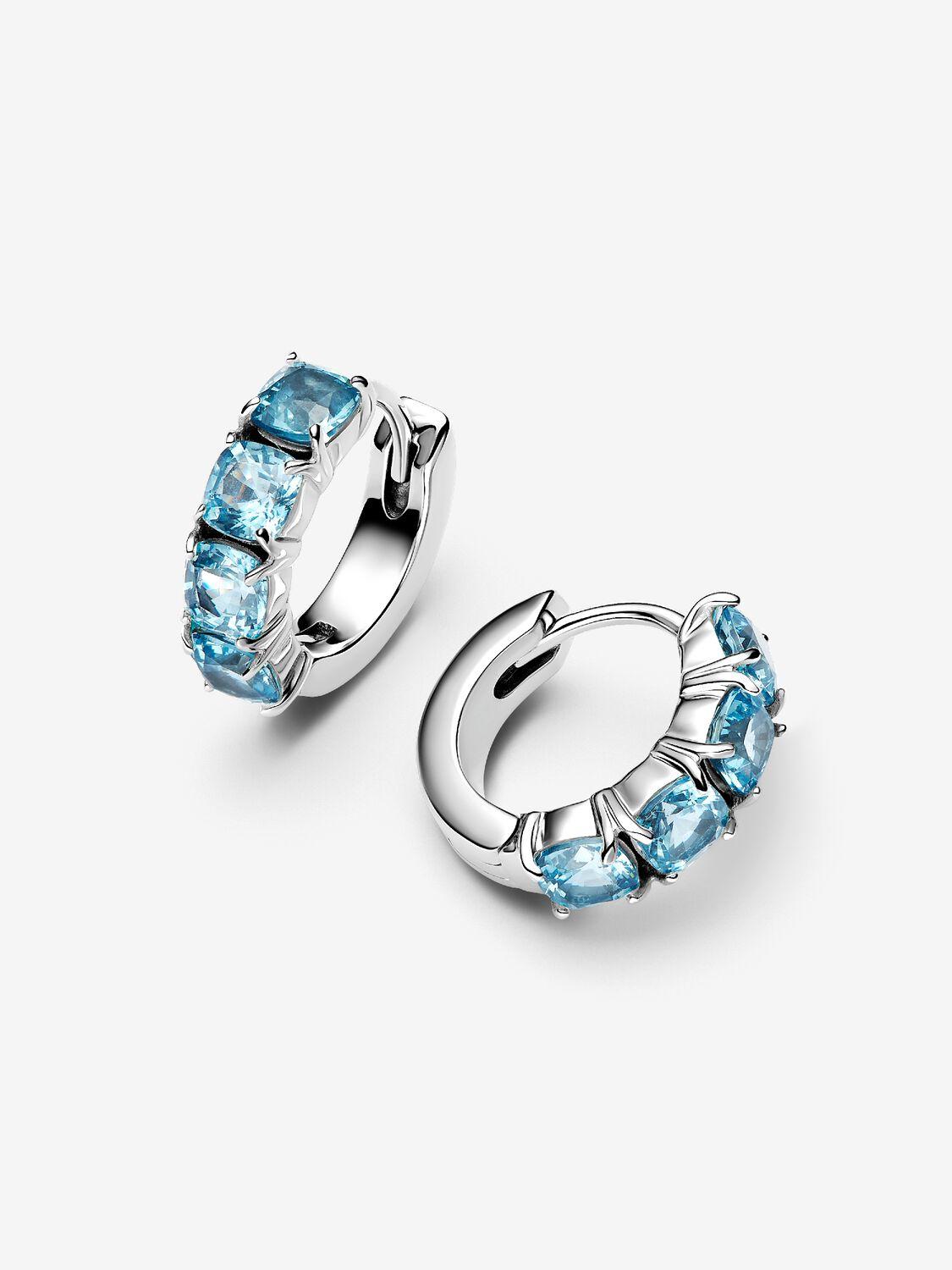 Sterling silver hoop earrings with aquamarine blue crystal