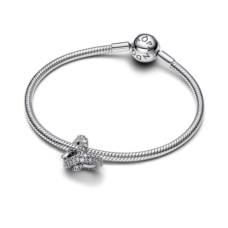 Infinity knot heart sterling silver charm with clear cubic zirconia