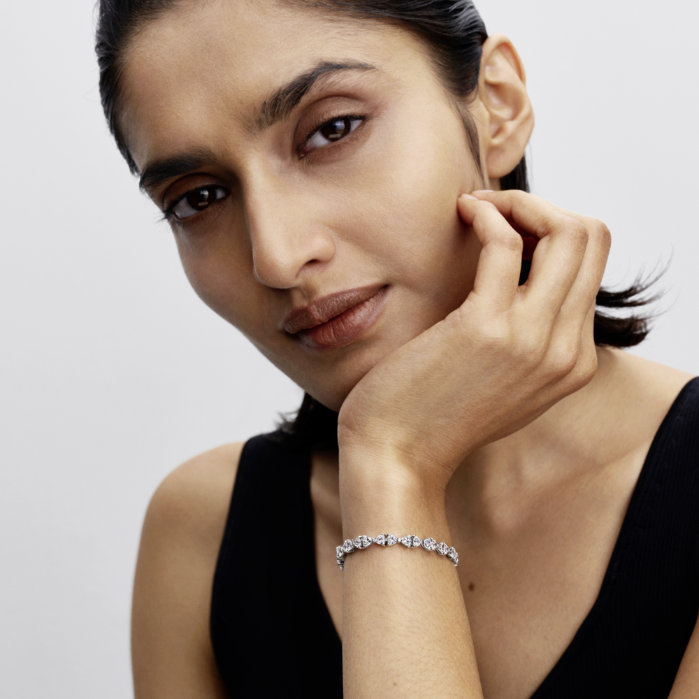 Bow sterling silver bracelet with clear cubic zirconia