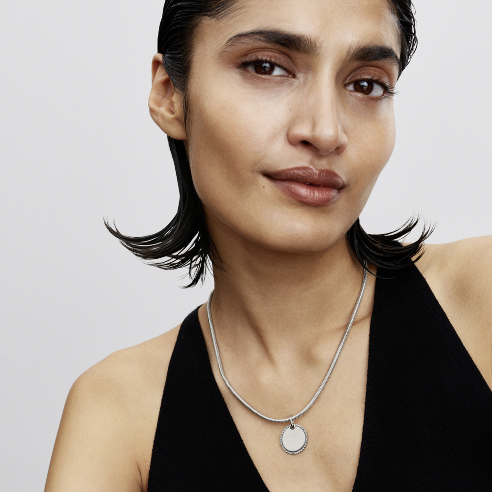 Engravable round sterling silver pendant with clear cubic zirconia