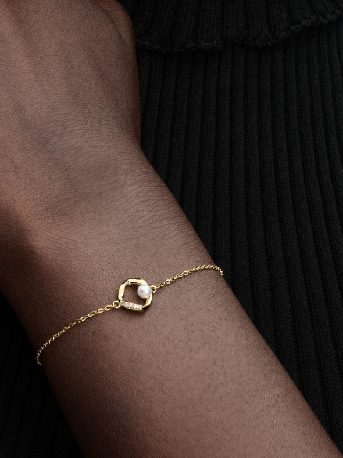 14k gold-plated bracelet with treated white freshwater cultured pearl and clear cubic zirconia