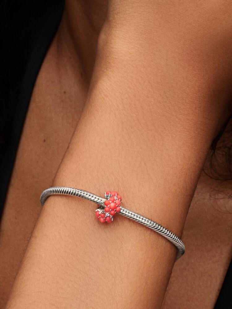 Sterling silver charm with clear cubic zirconia and imitation coral