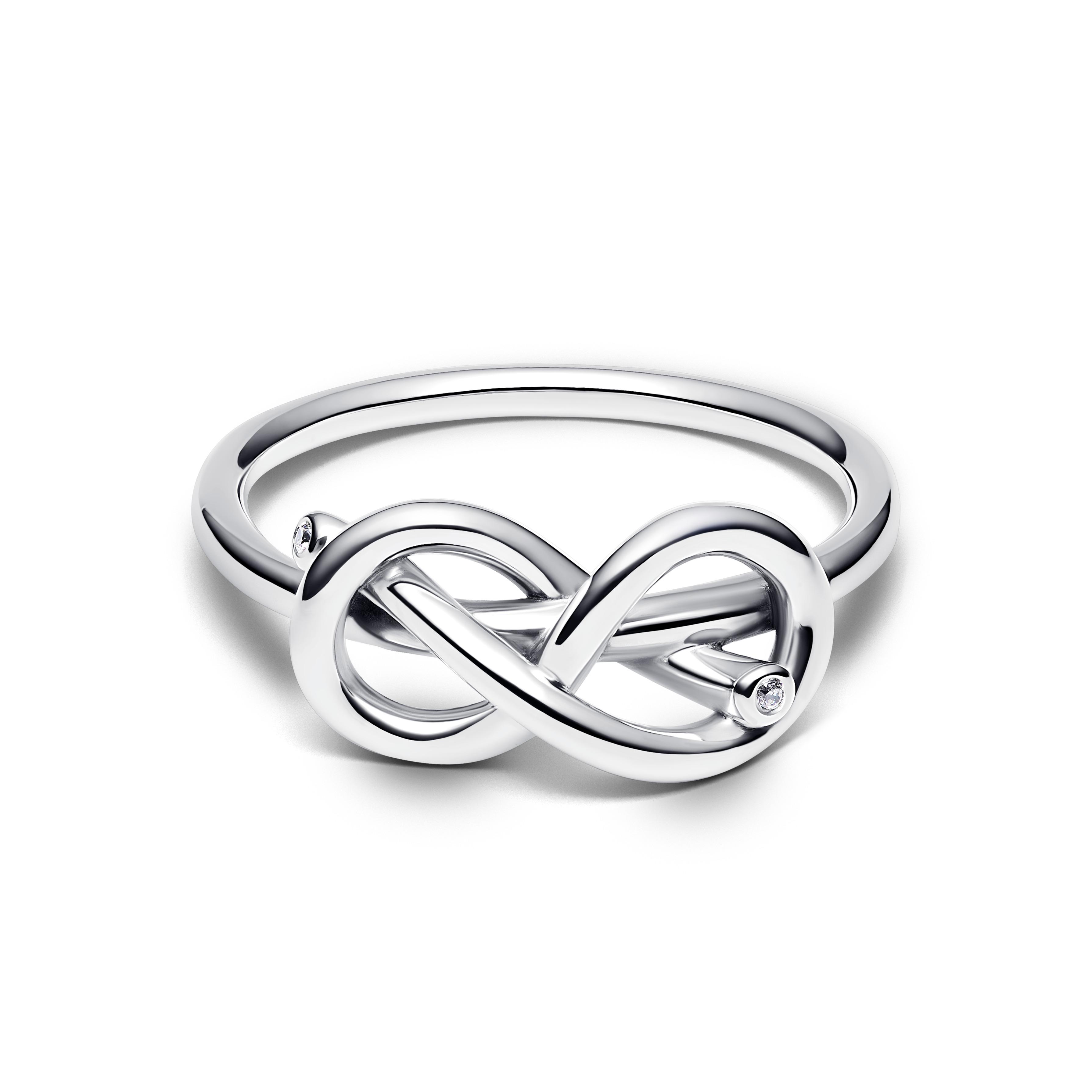 Infinity knot sterling silver ring with clear cubic zirconia