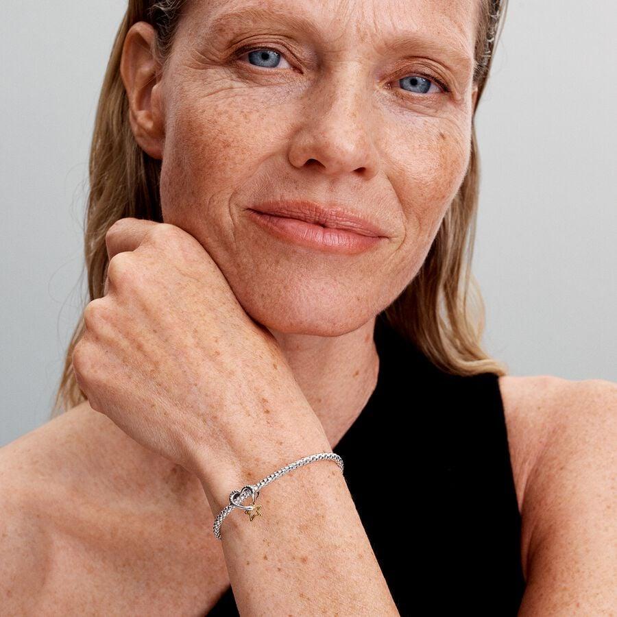 Heart and star sterling silver and 14k gold-plated charm