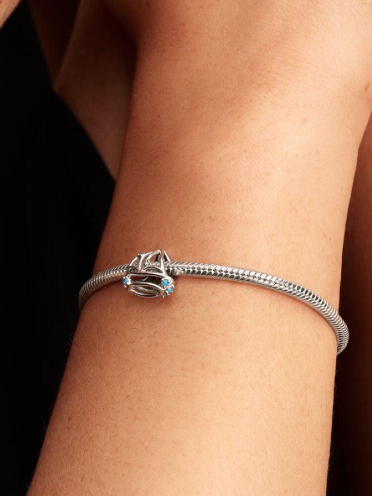 Sailboat sterling silver charm with clear cubic zirconia and capri blue crystal