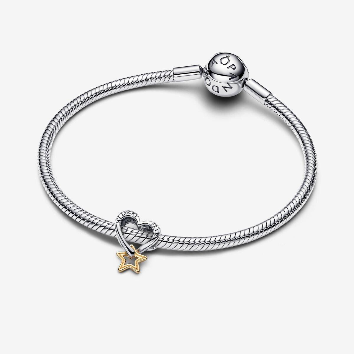 Heart and star sterling silver and 14k gold-plated charm