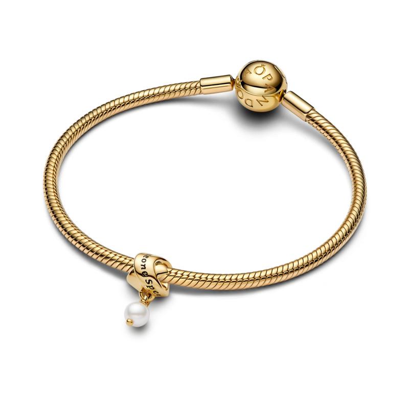 Someone special 14k gold-plated dangle with white treated freshwater cultured pearl and black enamel
