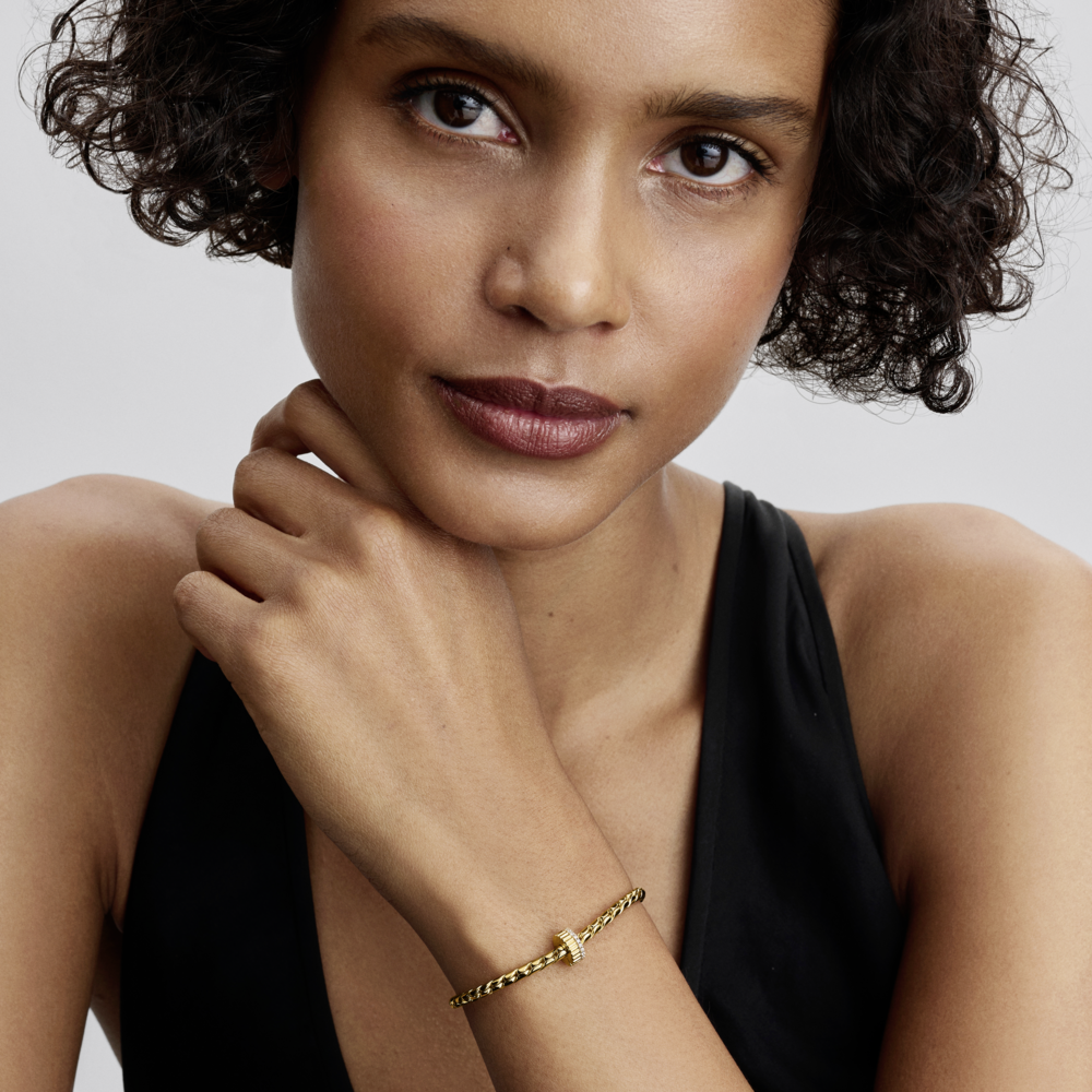 14k gold-plated clip with clear cubic zirconia and silicone grip