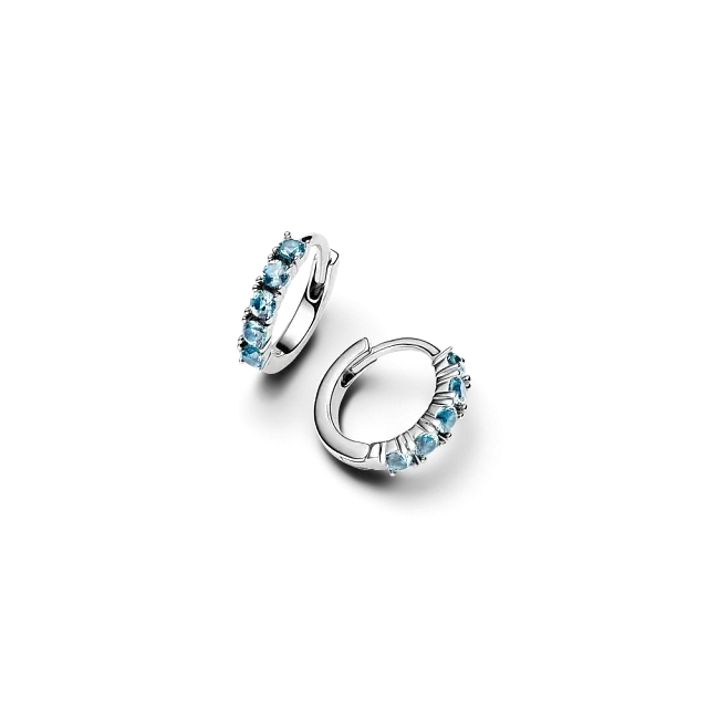 Sterling silver huggie earrings with aquamarine blue crystal
