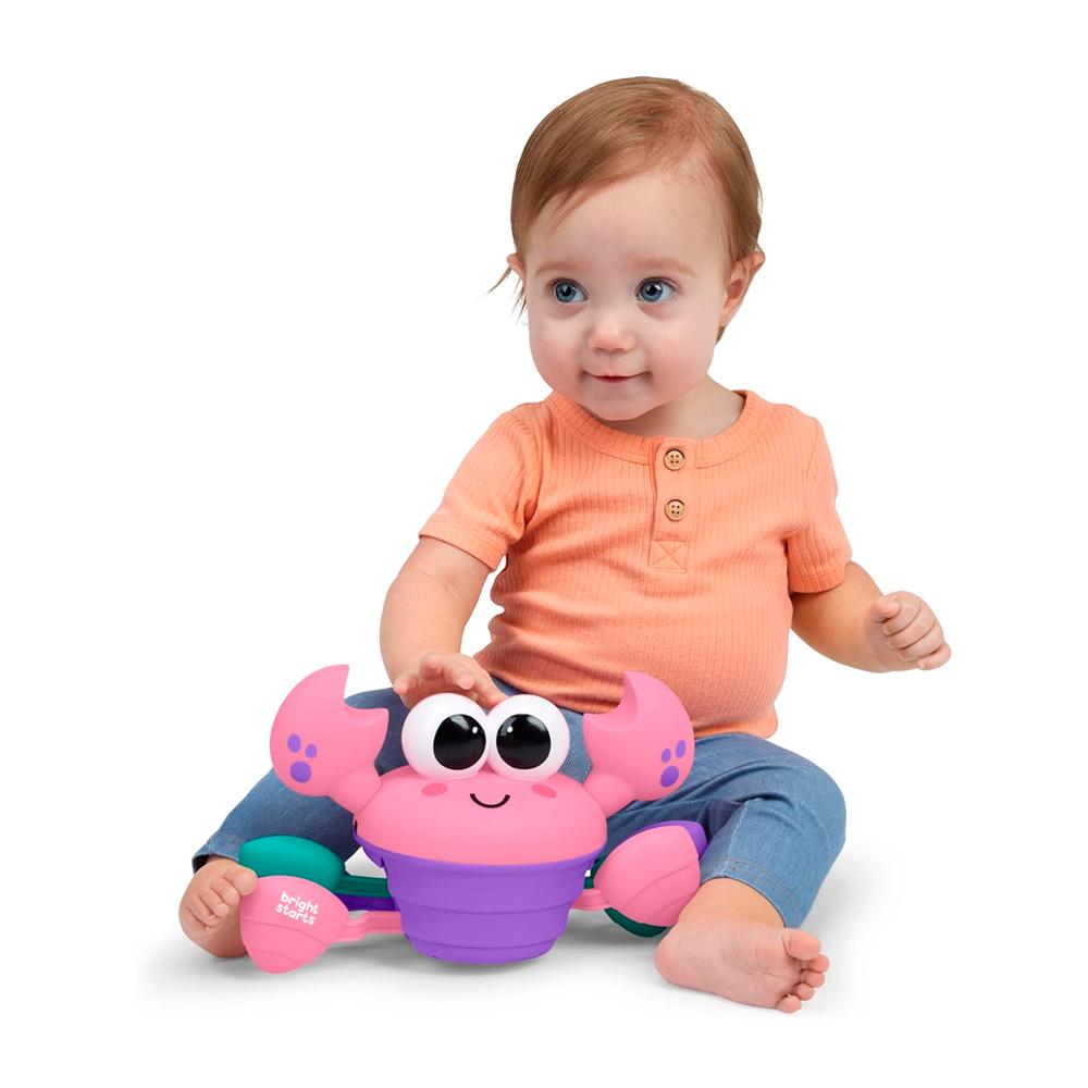 Игрушка музыкальная Bright Starts Rockin'crawling crab розовый