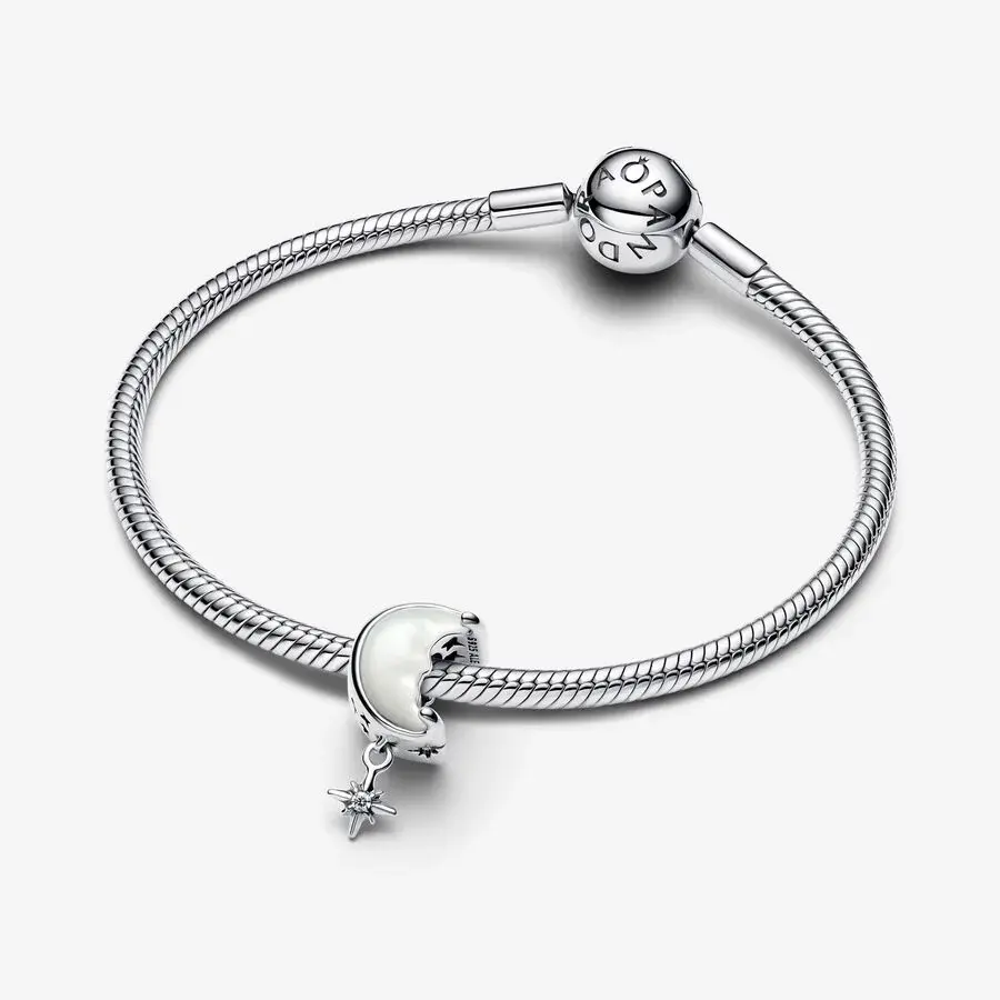 Moon and star sterling silver charm with white bioresin mother of pearl and clear cubic zirconia
