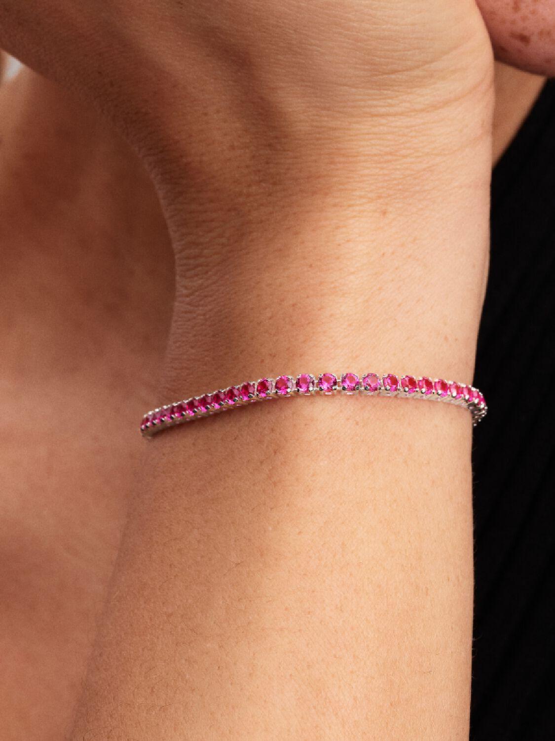 Sterling silver tennis bracelet with dark phlox pink crystal