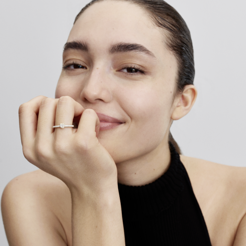 Heart 14k gold-plated ring with clear cubic zirconia and shimmering white enamel